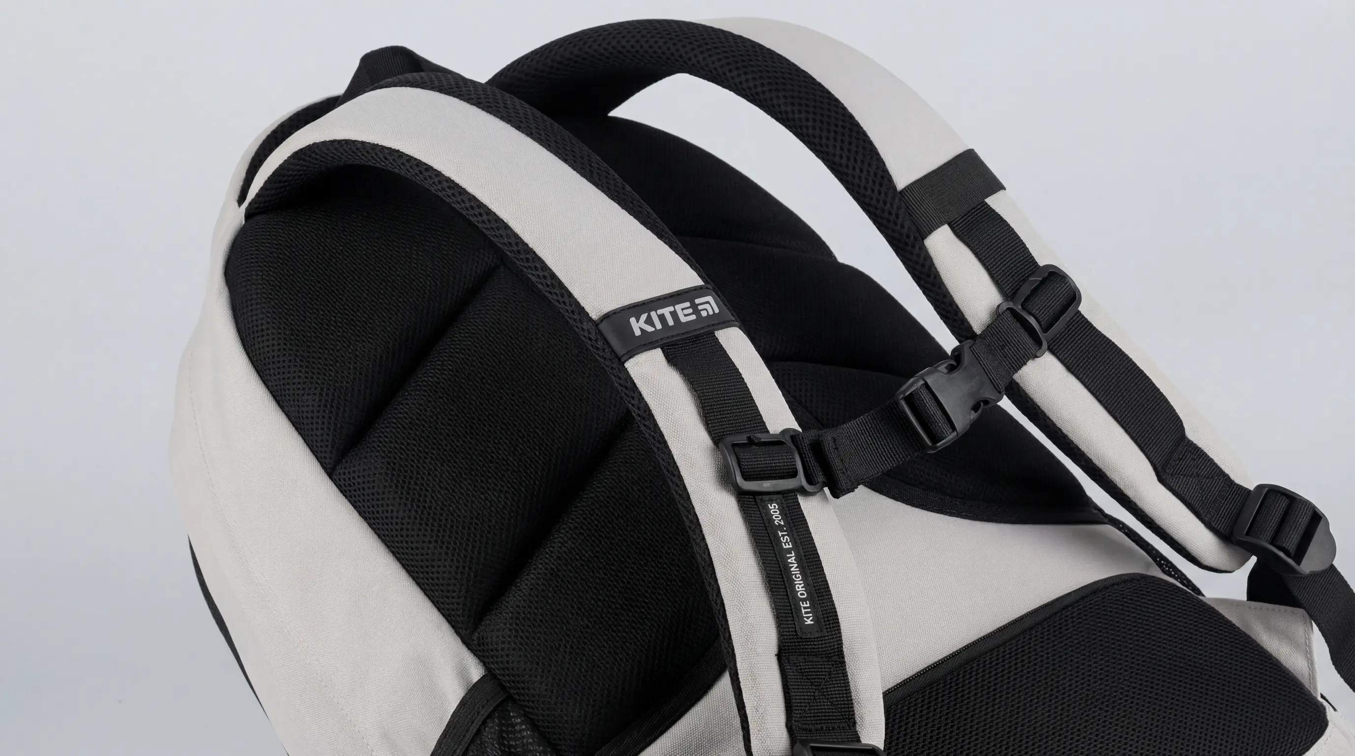 Close-up of ergonomic back panel and shoulder straps on teen backpack
