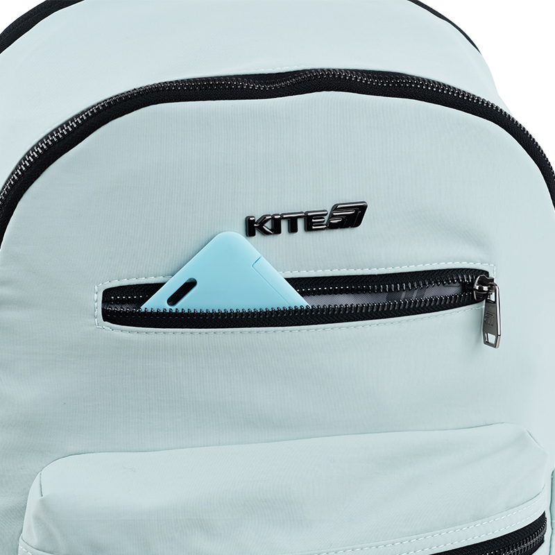 Blue minimalist backpack with padded straps and metal hardware